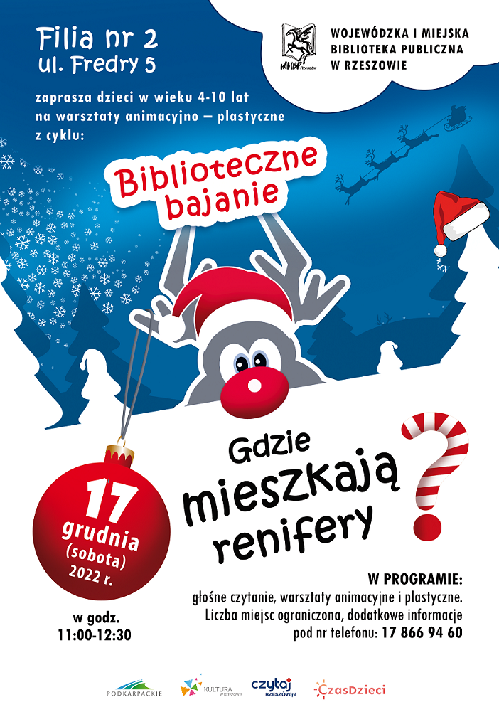 Renifer w&nbsp;czerwonej czapce w&nbsp;zimowym krajobrazie