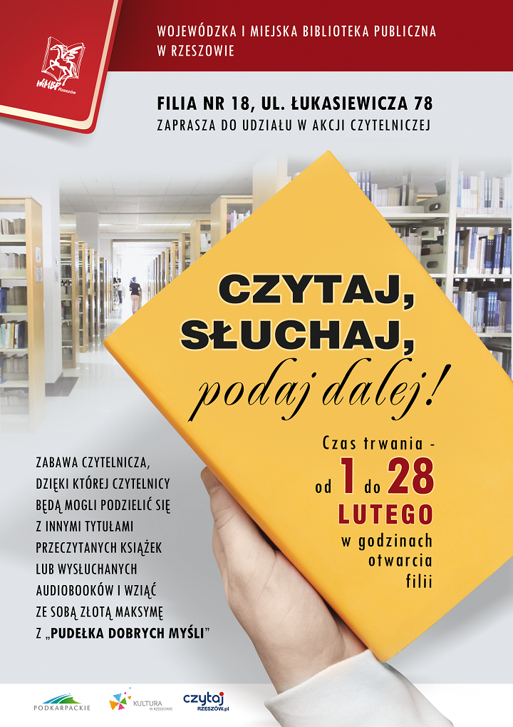 Ż&oacute;łta książka na&nbsp;tle regał&oacute;w bibliotecznych.