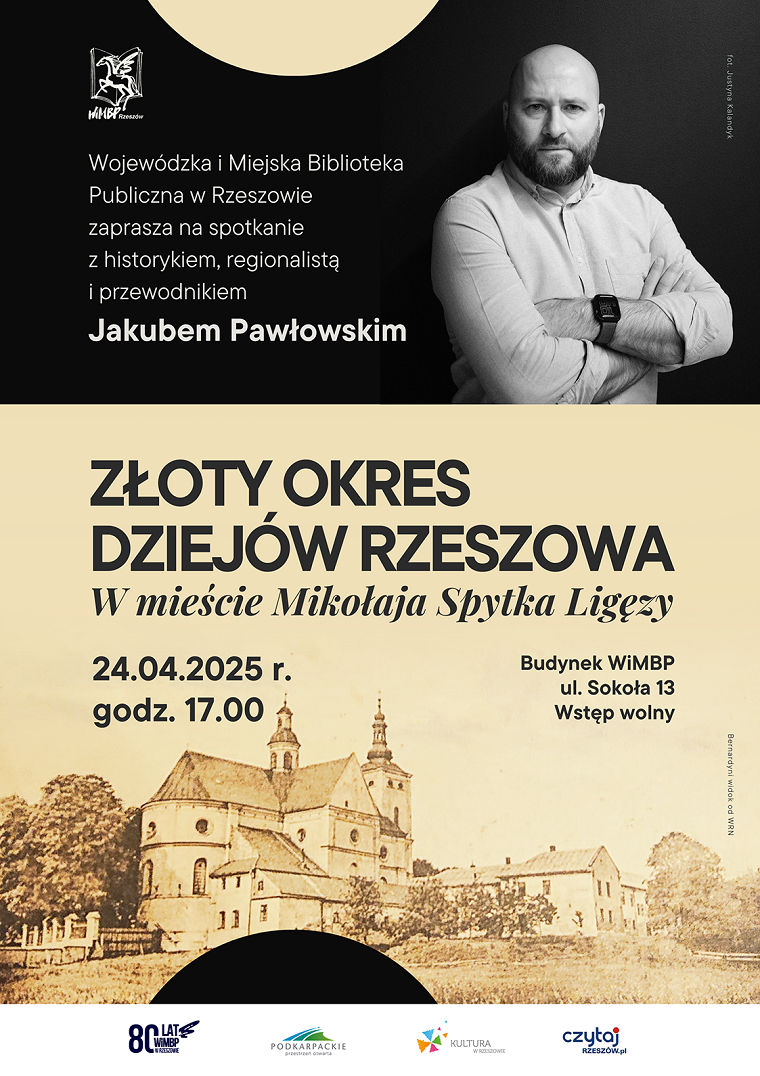 Brodaty mężczyzna w średnim wieku pozuje do zdjęcia z założonymi rękami