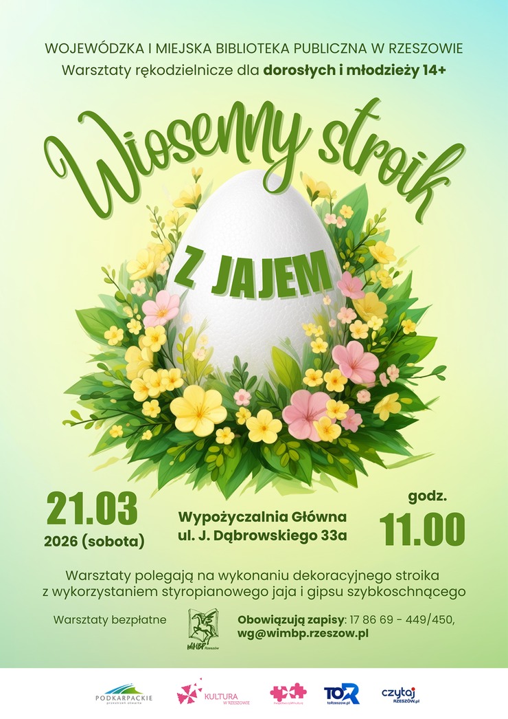 Stroik z&nbsp;jajem i&nbsp;kwiatami wok&oacute;ł. 